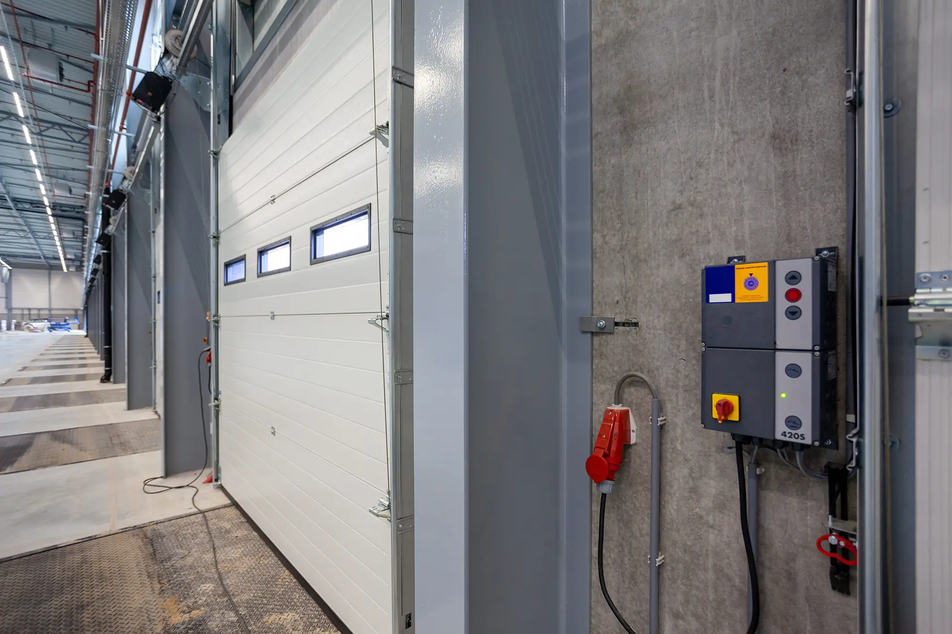 side view of garage door with control box on the side